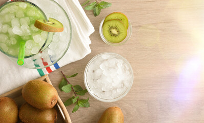 Cold kiwi drink on a table for summer top view