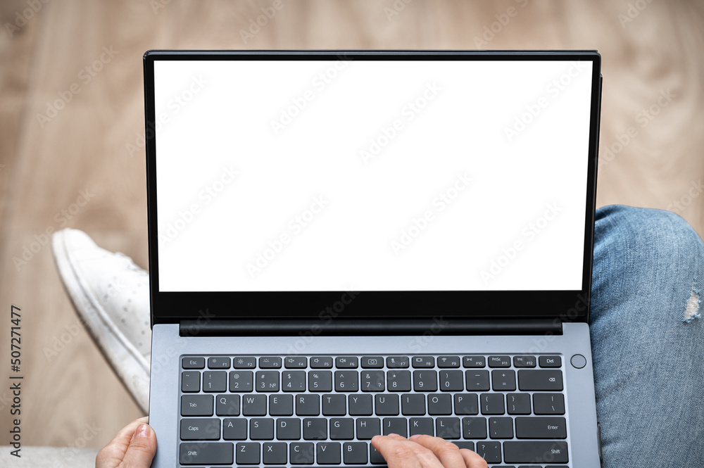 Poster top view mockup image of woman working and typing on laptop computer with blank screen while sitting