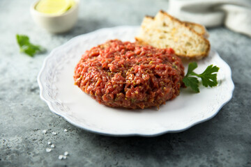 Homemade steak tartare served with bread