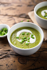 Homemade green pea soup with cream