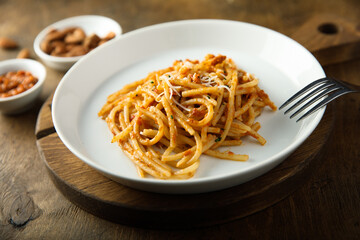 Pasta with red pesto and cheese