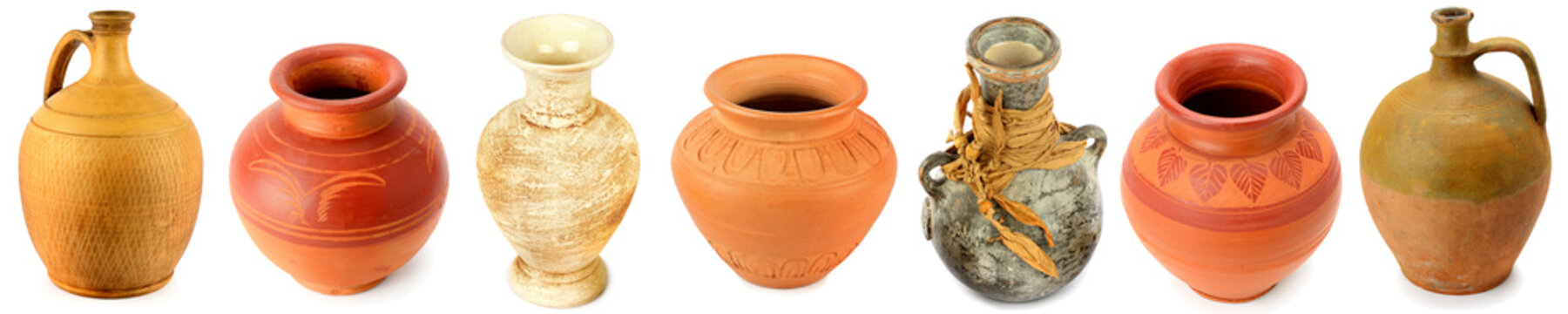 Panoramic collage of ceramic jugs, vase-amphoras isolated on white background.