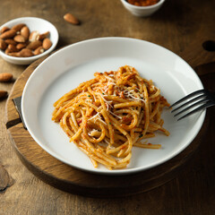 Pasta with red pesto and cheese