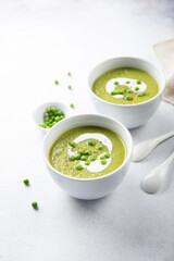 Homemade green pea soup with cream
