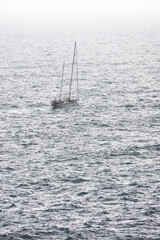 Lonely sailing boat on the sea of Liguria, Italy	