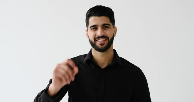 Businessman showing ok gesture with hand over white background