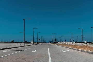 empty lanes of a street near the beach at the Beirut district of Biel - obrazy, fototapety, plakaty