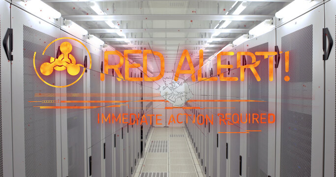 Image of red alert text and symbol over server room