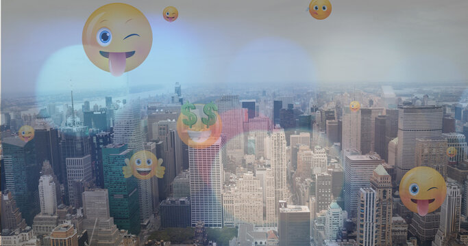 Image of emoji icons over lightspots and cityscape