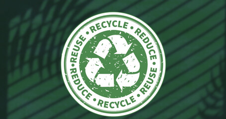 Image of recycling icon with text over shadow of plants on green background