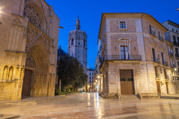 Fototapeta na wymiar Valencia - The square Plaza de Mare de Deu with the Cathedral at dusk.