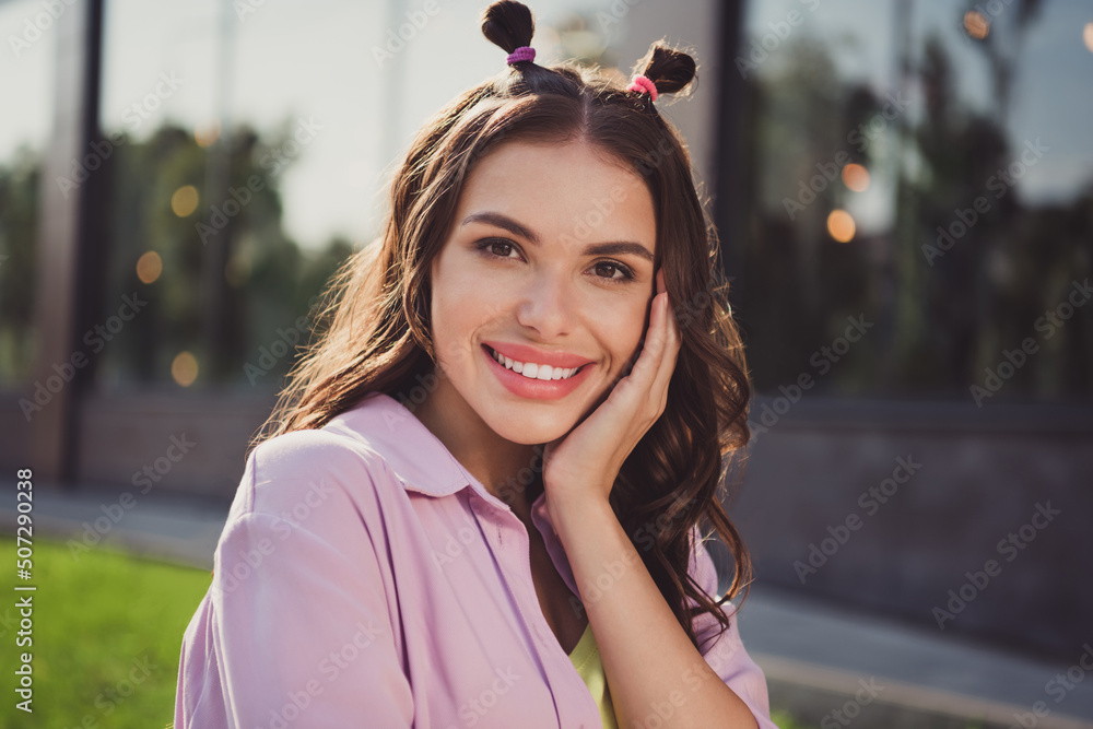 Sticker portrait of attractive cheerful wavy-haired girl enjoying good mood spending spare time day on fresh