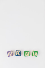 An arrangement of children painted alphabet wooden blocks spelling out 