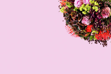 Colorful flower bouquet isolated on pink background. Copy space. High quality photo