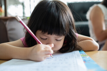girl doing homework, kid writing paper, education concept, back to school
