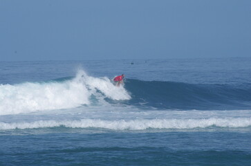 Obraz premium Surfers at Ujung Bocur