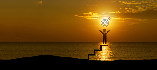 Silhouette of man icon holding a target board on top of  ladder, concept of aim and objective...