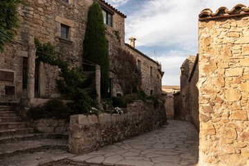 typical stone street in the picturesque medieval town of pals on the costa brava