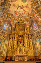 VALENCIA, SPAIN - FEBRUAR 17, 2022: The baroque altar and presbytery of church Iglesia San Nicolas with the frescoes Antonio Palomino and Dionis Vidal (1700).