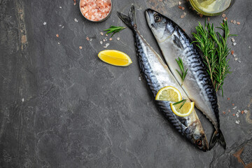 marinated mackerel or herring fish with salt, lemon and spices on a metal tray. Seafood concept....