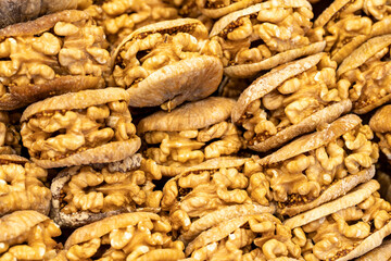 Walnut figs. Figs with walnut filling are healthy food. Close-up. local name cevizli kuru incir