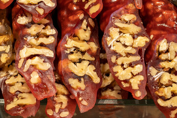 Pomegranate walnut sausage. Sweet snack. Close-up. local name cevizli sucuk