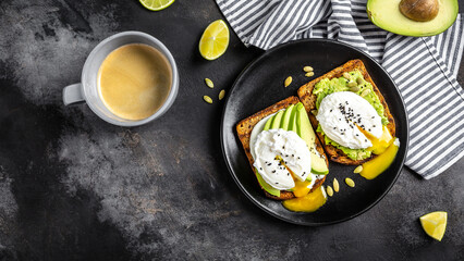 Sandwiches with avocado and poached egg. Healthy food, keto diet, diet lunch concept. Top view