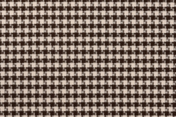 White brown textile cloth texture background. shirt fabric with a checkered pattern. factory...