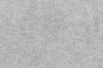 White fabric soft texture of a terry towel close-up.