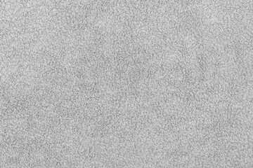 White fabric soft texture of a terry towel close-up.