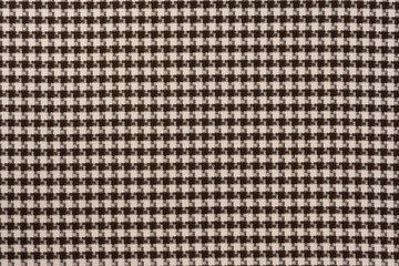 White brown textile cloth texture background. shirt fabric with a checkered pattern. factory...