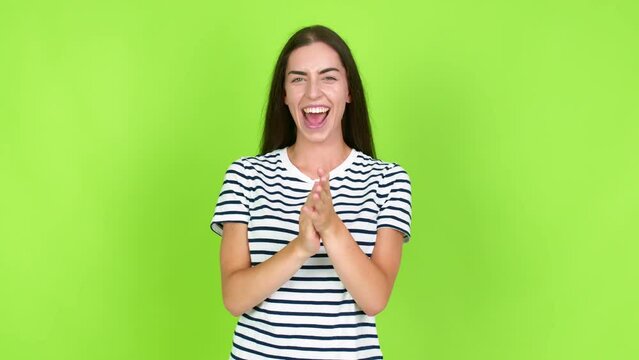 Young brunette woman applauding after presentation in a conference over isolated background. Green screen chroma key