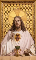 Poster Im Rahmen VALENCIA, SPAIN - FEBRUAR 17, 2022: The carved polychrome relief of Jesus with the Eucharist in the church Iglesia del Temple by Jose Maria Ponsoda Bravo from 20. cent. © Renáta Sedmáková
