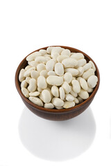 white beans in a bowl on a white background, isolated