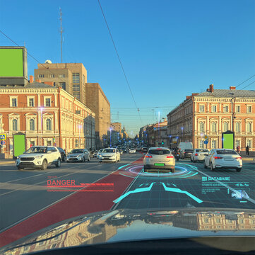 A modern car drives and scans the road, artificial intelligence analyzes road conditions.