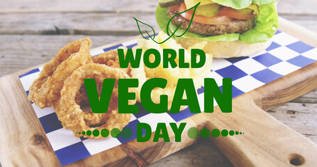 Image of world vegan day text over fresh hamburger