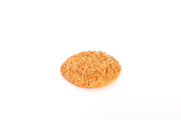 Oatmeal, fig, hazelnut, pistachio and sesame cookies on a white background. Enjoyable snack.