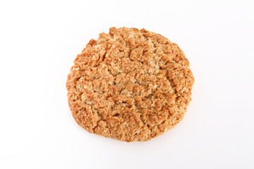 Oatmeal, fig, hazelnut, pistachio and sesame cookies on a white background. Enjoyable snack.
