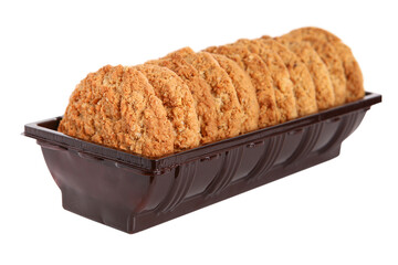 Oatmeal, fig, hazelnut, pistachio and sesame cookies on a white background. Enjoyable snack.