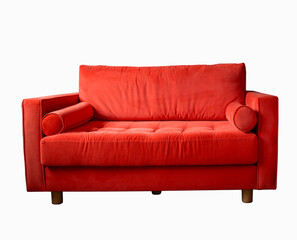 Red sofa with rollers on wooden legs isolated on white. Red couch isolated
