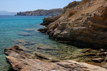 View of the rocky beach of Valmas in Ios Greece
