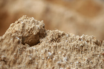 Sand grain construction texture background colose up