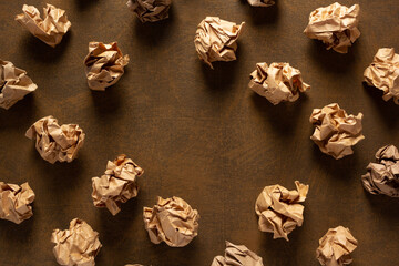 Crumpled paper balls on abstract background texture. Inspiration creative idea concept