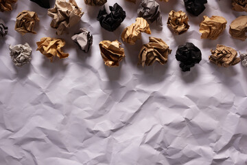 Crumpled paper balls on white  crumpled background texture. Inspiration creative idea