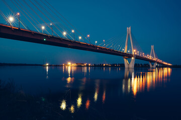 night glowing bridge over the river
