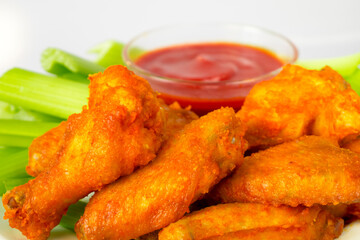 White plate, delicious, tasty, chipotle wings, spicy chicken wings