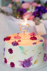 Birthday cake with star sparklers candle