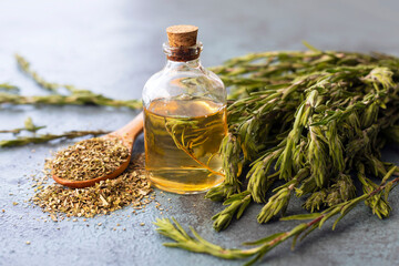 organic essantial thyme oil with green leaves