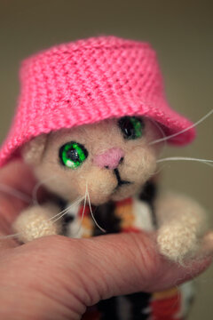 Toy cat hand made in costume of kalush orkestra