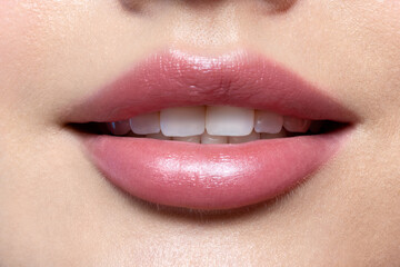 Close up beautiful female lips with natural make up